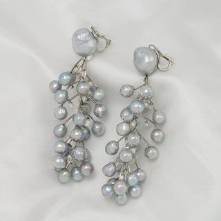 Baroque South Sea pearl, Akoya pearl, and diamond vine earrings
Clip-back earrings · 50 pearls · 15.49 ctw diamonds · 3.75 inches · platinum