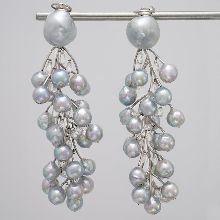 Baroque South Sea pearl, Akoya pearl, and diamond vine earrings
Clip-back earrings · 50 pearls · 15.49 ctw diamonds · 3.75 inches · platinum