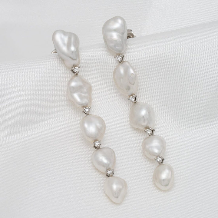 white South Sea keshi pearl and diamond drop earrings