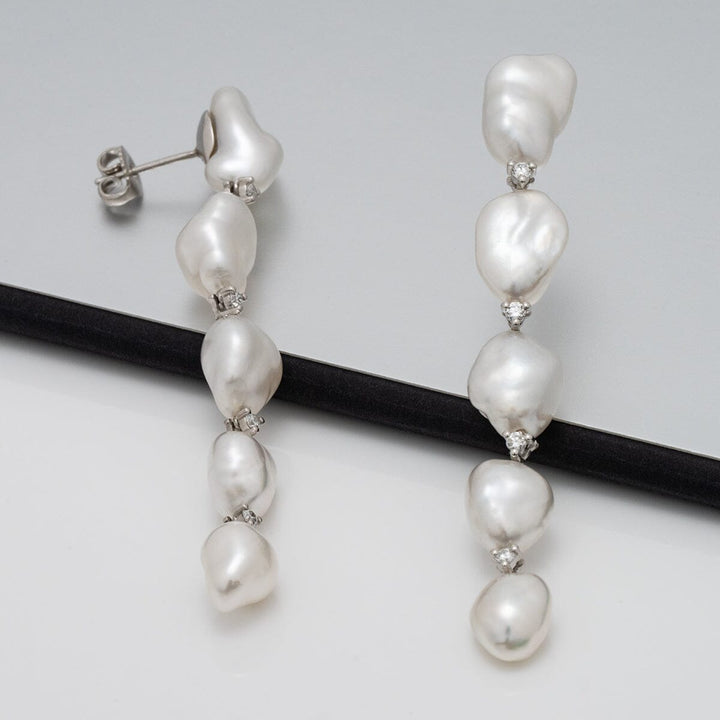white South Sea keshi pearl and diamond drop earrings