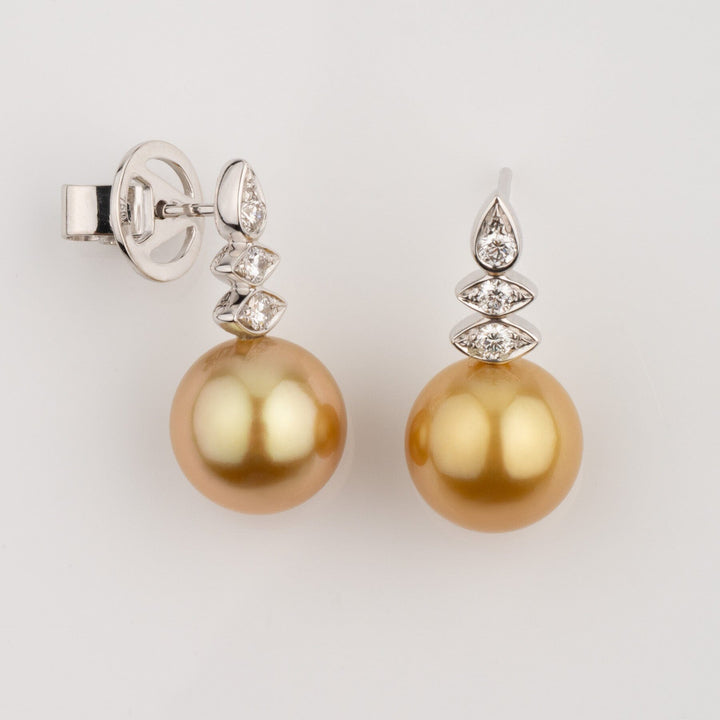 Assael Collection: 10.0–10.5 mm Golden South Sea Pearl and Diamond Earrings featuring lustrous golden pearls accented with sparkling diamond settings on elegant stud backings.