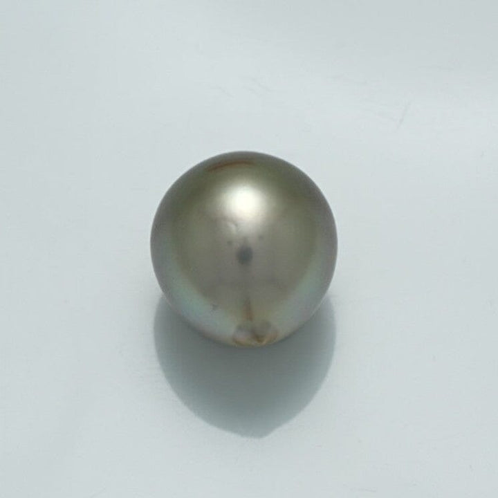 Single lustrous 12.3 x 10.9 mm Fijian Drop Pearl with smooth surface and subtle iridescent shades, perfect for elegant pearl jewelry designs.
