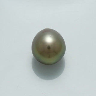 Single 12.3 x 10.9 mm Fijian Drop Pearl with a smooth, lustrous surface and subtle iridescent shades, ideal for creating elegant pearl jewelry pieces.