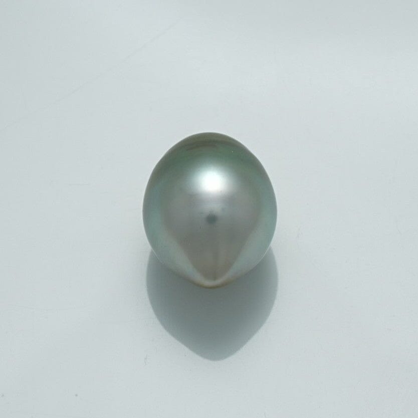 Single lustrous 13.2 x 10.5 mm Fijian Drop Pearl with a smooth, reflective surface and subtle greenish-gray tones casting a soft shadow on a plain background.