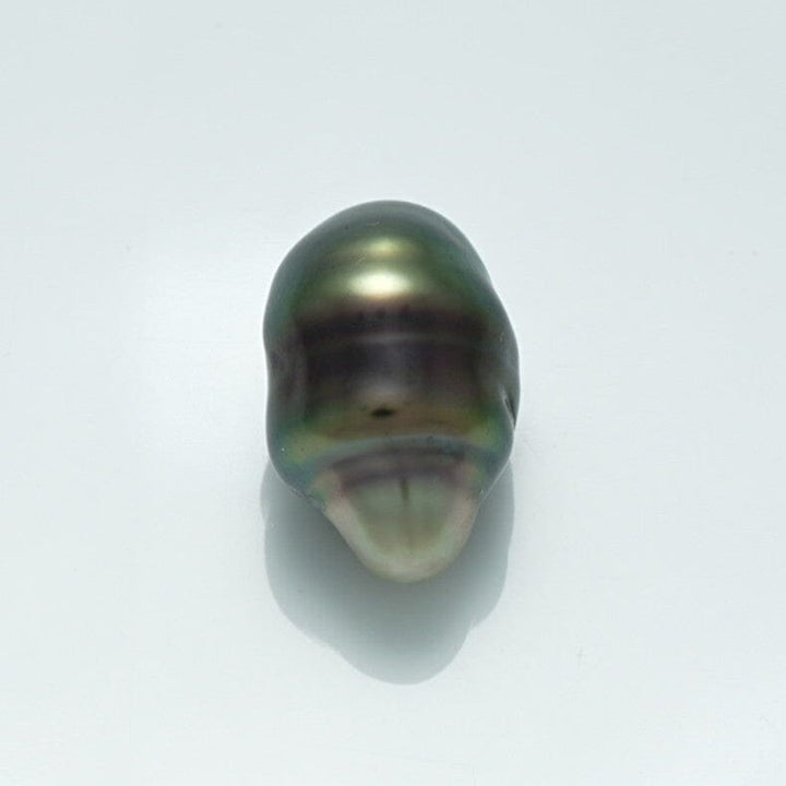 15.4 x 10.7 mm Fijian Keshi Pearl with an irregular shape and deep green-black iridescent surface, showcasing natural luster and unique organic form.