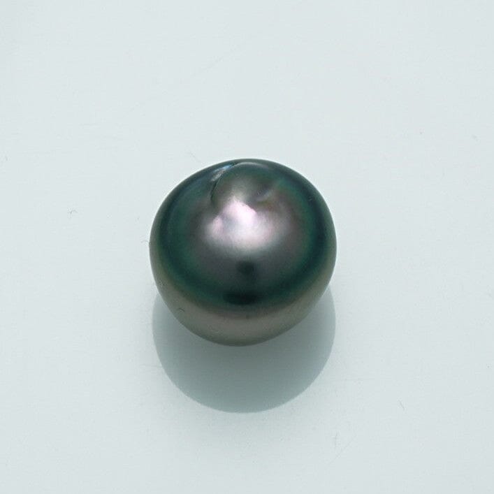 10.5 x 8.8 mm Fijian Keshi Pearl with dark, lustrous surface showcasing natural shape and subtle iridescent hues typical of fine Fijian pearls.