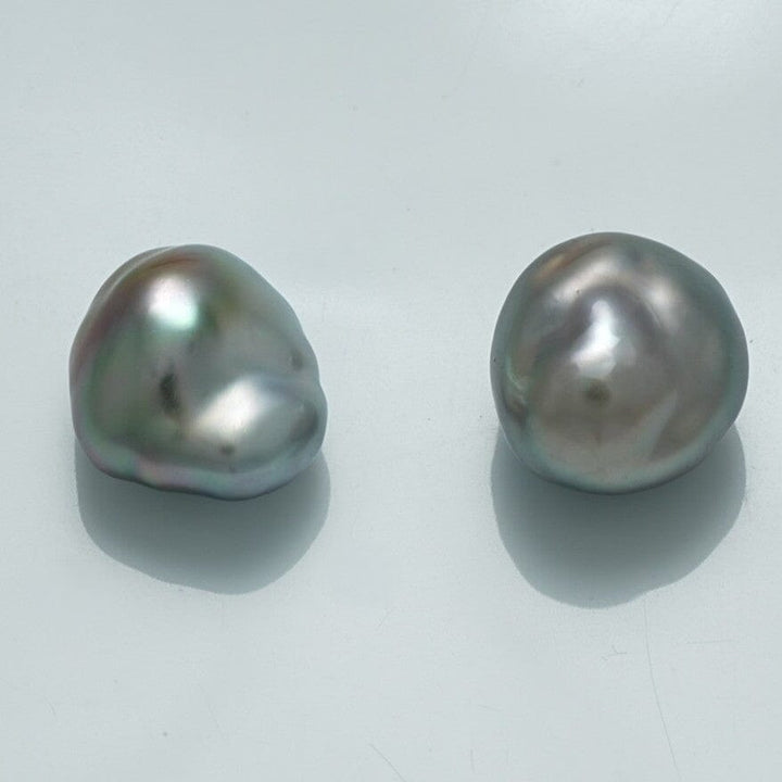 12.5 x 11.2 mm and 12.0 x 11.1 mm Fijian Keshi Pearl Pair showcasing unique organic shapes with soft gray and silver tones, ideal for fine pearl jewelry collections.