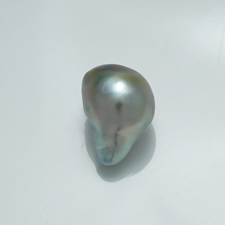 14.8 x 10.3 x 11.8 mm Fijian Baroque Pearl with an irregular shape and natural lustrous surface showcasing subtle shades of gray, green, and blue highlights.