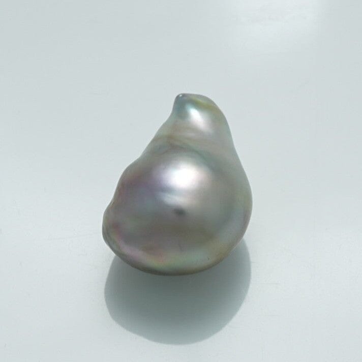 14.8 x 10.3 x 11.8 mm Fijian Baroque Pearl with an irregular shape and lustrous surface reflecting subtle shades of silver and lavender.