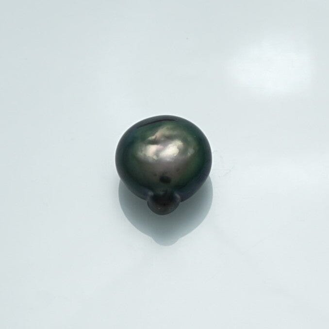 16.6 x 15.0 mm Fijian Keshi Pearl with a unique dark luster and natural irregular shape, showcasing the distinctive beauty of fine Fijian pearls.