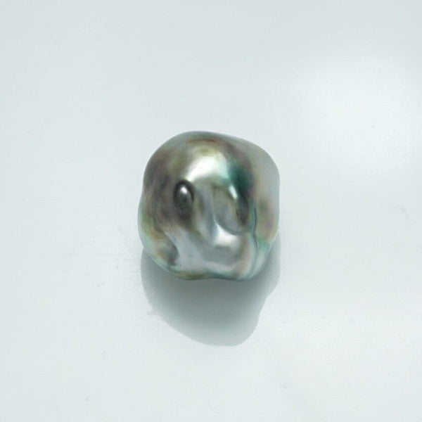 Single 14.7 x 13.5 mm Fijian Keshi Pearl with natural lustrous surface and irregular shape, showcasing subtle shades of gray, green, and blue on a clean white background.