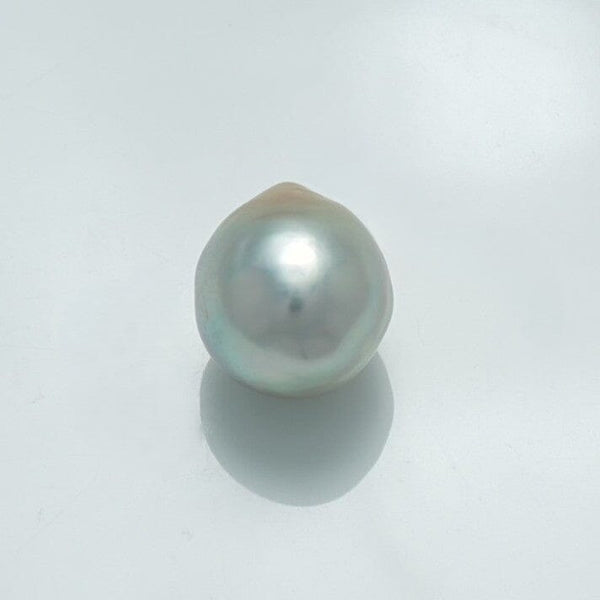 Single lustrous 12.1 x 10.5 mm Fijian Drop Pearl with a smooth surface and subtle iridescent shades of white and silver, displayed on a plain light background.