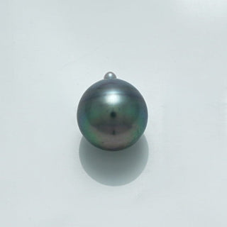 11.5 x 10.0 mm Fijian Drop Pearl with deep green and black overtones, showcasing a smooth, lustrous surface and a shimmering iridescent finish.