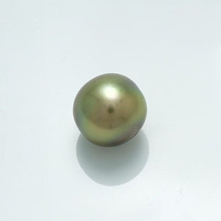 9.7 x 9.6 mm Fijian Round Pearl with a smooth, lustrous surface showcasing subtle green and gold tones on a clean white background.
