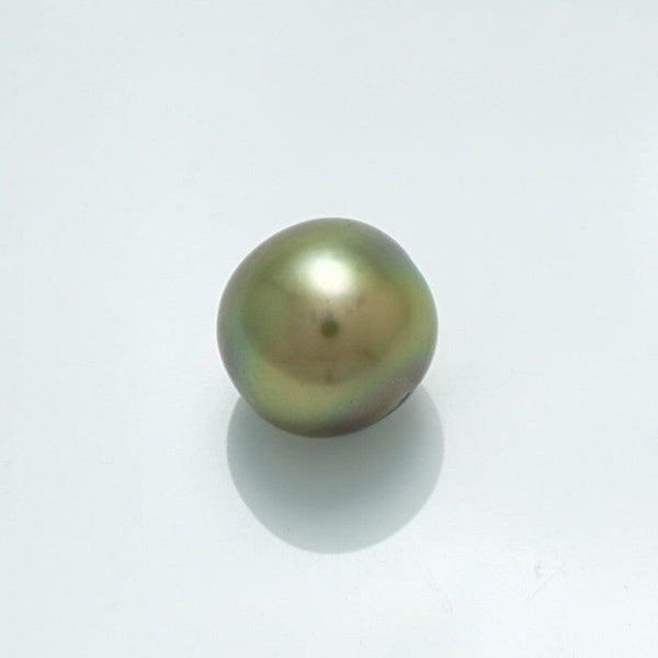 9.7 x 9.6 mm Fijian Round Pearl with a smooth, lustrous surface showcasing subtle green and gold tones on a clean white background.