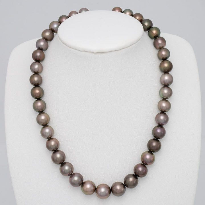 9.2–12.5 mm natural-color Dark Chocolate Fijian pearl strand on bust