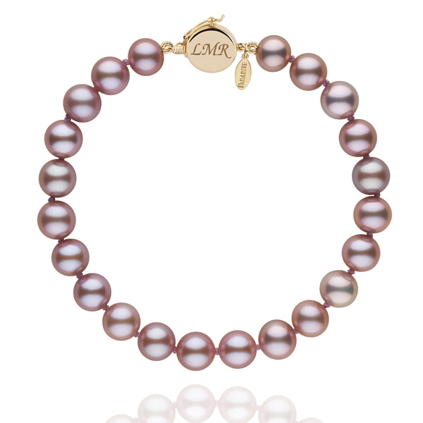 Personalized 7.5-8.0 mm Lavender Freshadama Freshwater Pearl Circle Clasp Bracelet featuring lustrous lavender freshwater pearls with a gold circle clasp engraved with initials.