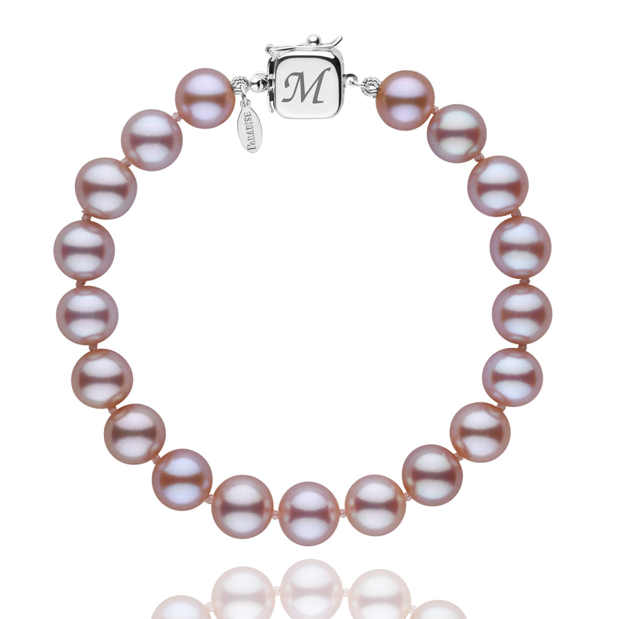 Personalized 8.5-9.0 mm Lavender Freshadama Freshwater Pearl Square Clasp Bracelet featuring round lavender freshwater pearls and a 14K white gold square clasp engraved with the letter M.
