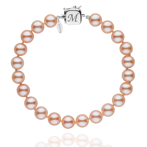 Personalized 7.5-8.0 mm Pink to Peach Freshadama Freshwater Pearl Square Clasp Bracelet featuring lustrous round pearls and a 14K white gold square clasp engraved with an initial.