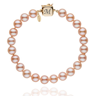 Personalized 7.5-8.0 mm Pink to Peach Freshadama Freshwater Pearl Square Clasp Bracelet featuring lustrous round pearls with a gold square clasp engraved with the letter M.