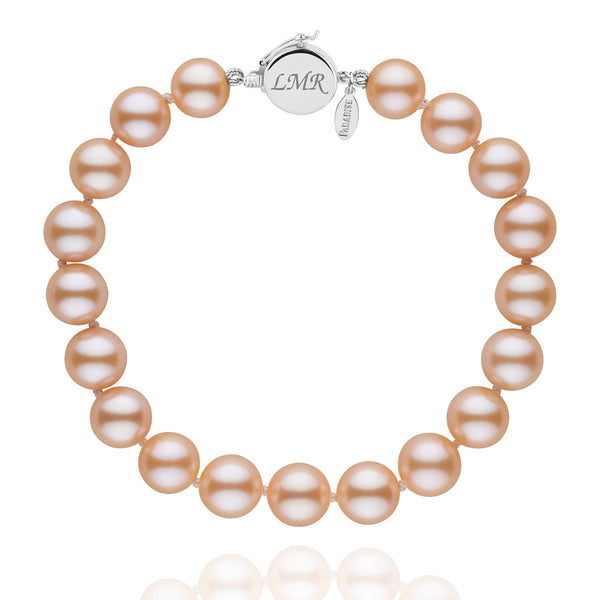 Personalized 8.5-9.0 mm Pink to Peach Freshadama Freshwater Pearl Circle Clasp Bracelet featuring lustrous pink to peach freshwater pearls with a round 14K white gold circle clasp engraved with initials.