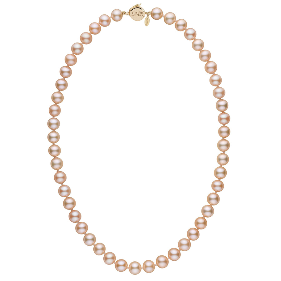 Personalized 8.5-9.0 mm Pink to Peach Freshadama Freshwater Pearl Circle Clasp Necklace featuring a strand of lustrous pink to peach freshwater pearls with a gold circle clasp and engraved charm.