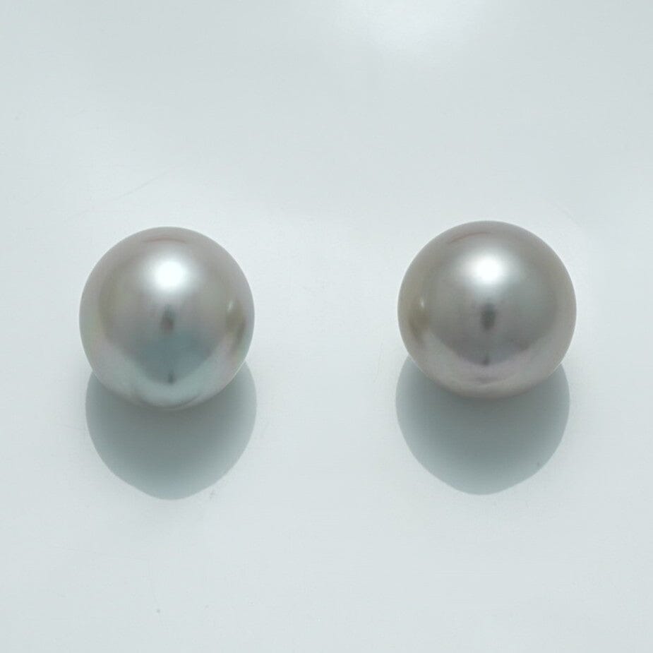 12.8 x 11.7 mm and 12.4 x 11.9 mm Fijian Drop Pearl Pair showcasing lustrous, smooth, round grey pearls with subtle overtones, perfect for elegant pearl jewelry designs.
