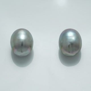 12.7 x 10.3 mm and 12.6 x 10.2 mm Fijian Drop Pearl Pair in soft gray hues with subtle iridescent overtones, showcasing natural drop-shaped cultured pearls.
