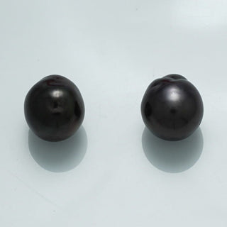 12.4 x 11.6 x 11.3 mm and 12.9 x 11.4 x 11.2 mm Fijian Baroque Pearl Pair with lustrous dark surfaces and unique organic shapes, showcasing fine cultured black pearls.