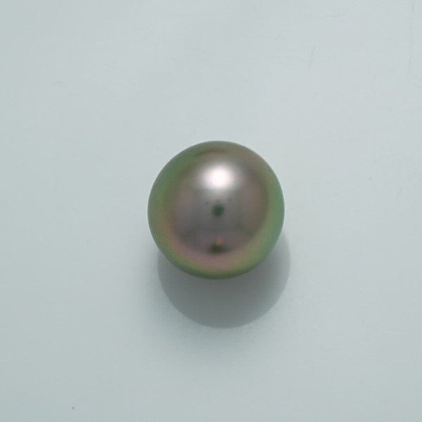 Single lustrous 10.9 x 10.6 mm Fijian Pearl showcasing a smooth surface with subtle iridescent hues of green and pink, ideal for fine pearl jewelry pieces.