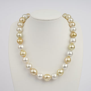 Necklace displayed on a white bust featuring 12.0–15.5 mm AAA white and golden South Sea semi-baroque pearls with lustrous irregular shapes.