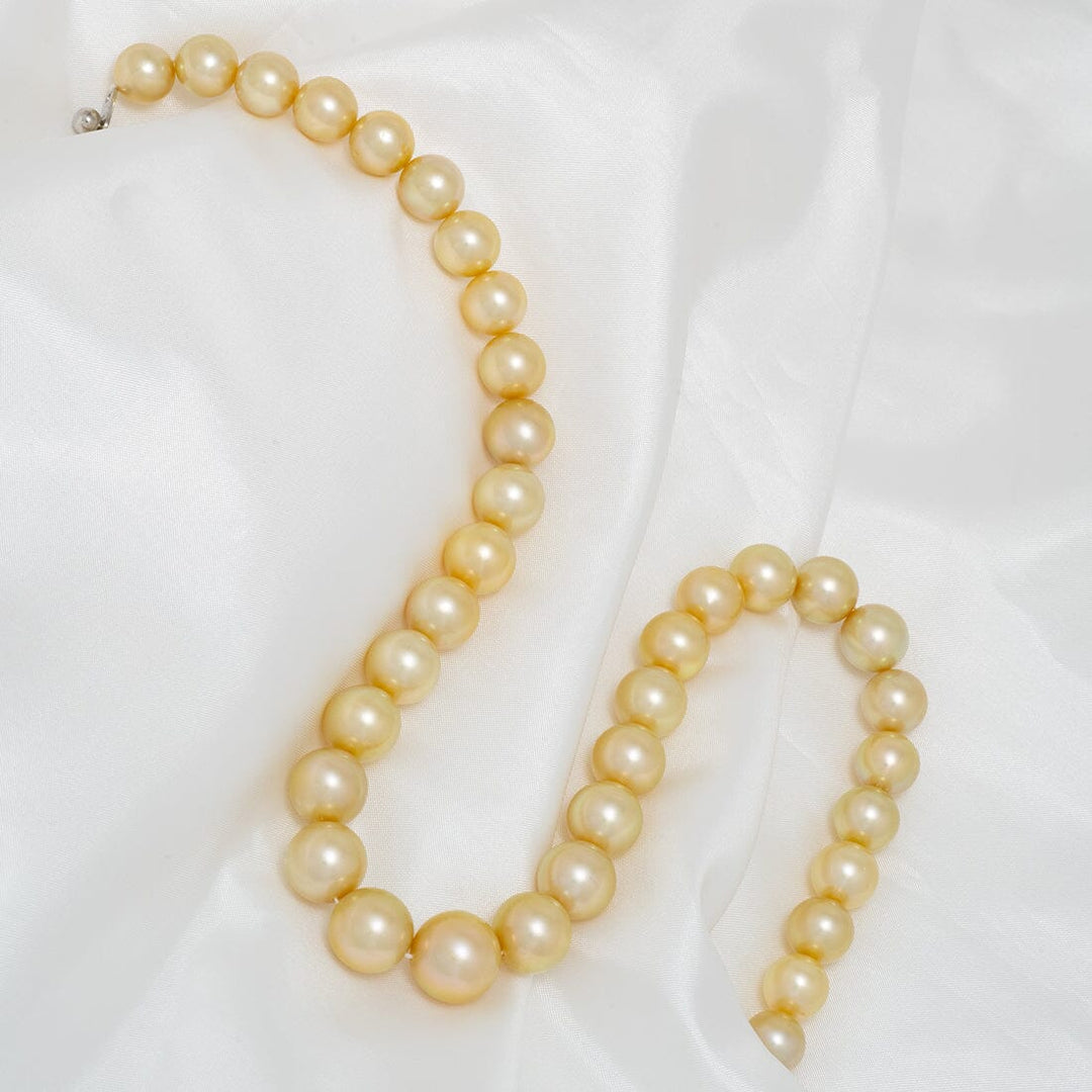 J-16: 10-13.8 mm Round Golden South Sea Pearl Strand