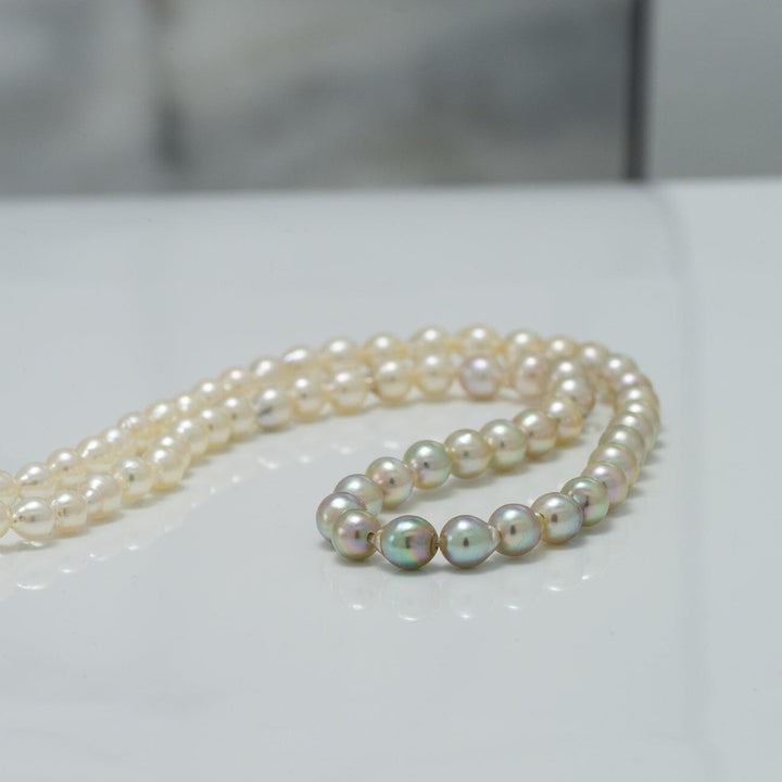 JF-11: 2.5-4.0 mm Pistachio Ombre Akoya Drop Pearl Strand