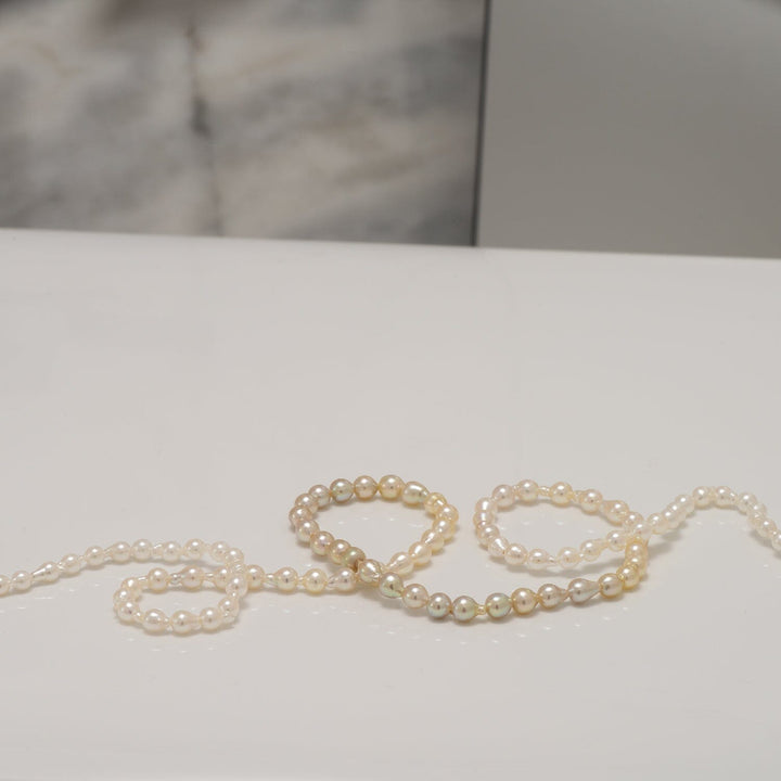 JF-11: 2.5-4.0 mm Pistachio Ombre Akoya Drop Pearl Strand