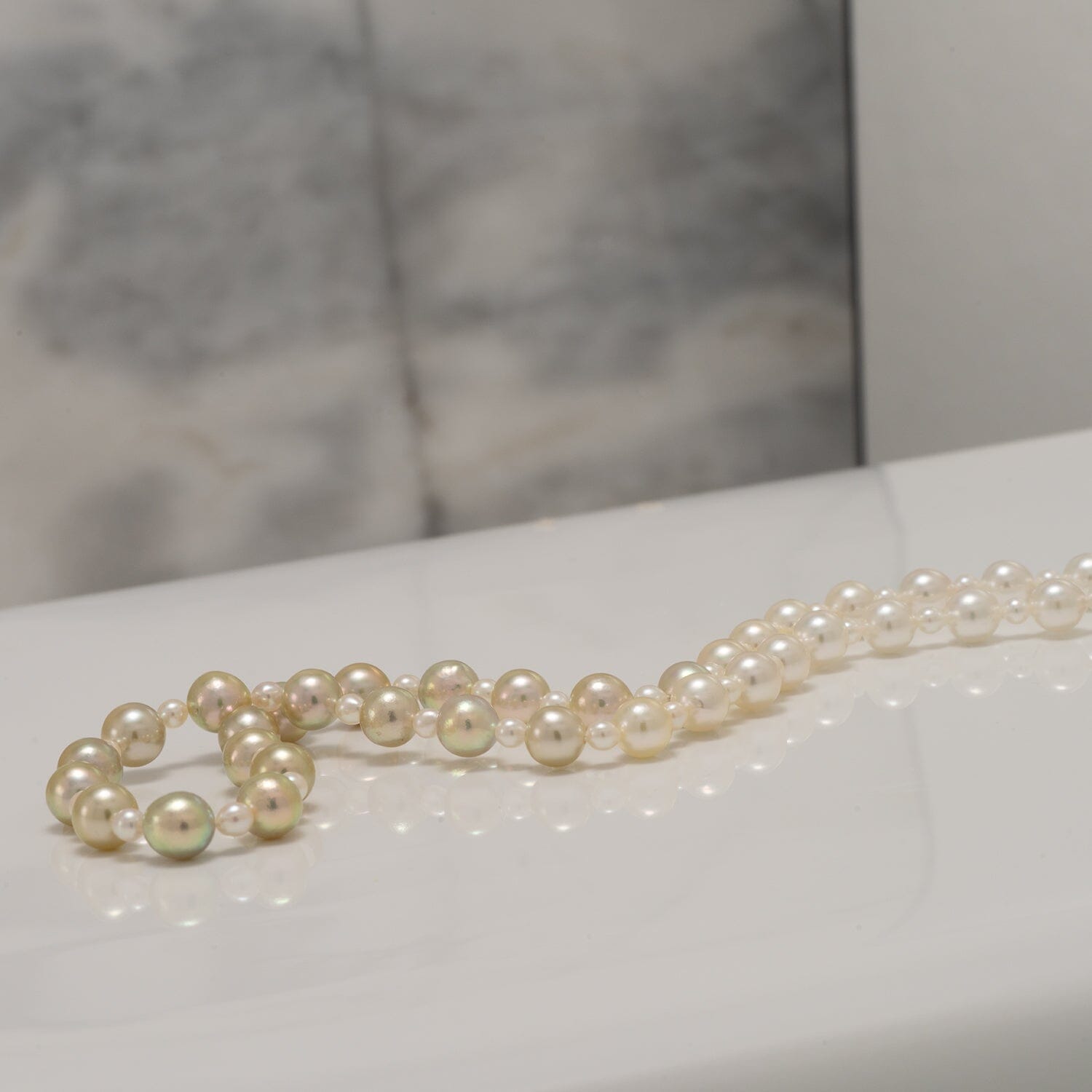 JF-12: 2.0-5.5 mm Pistachio Ombre Akoya Semi-Round Pearl Strand