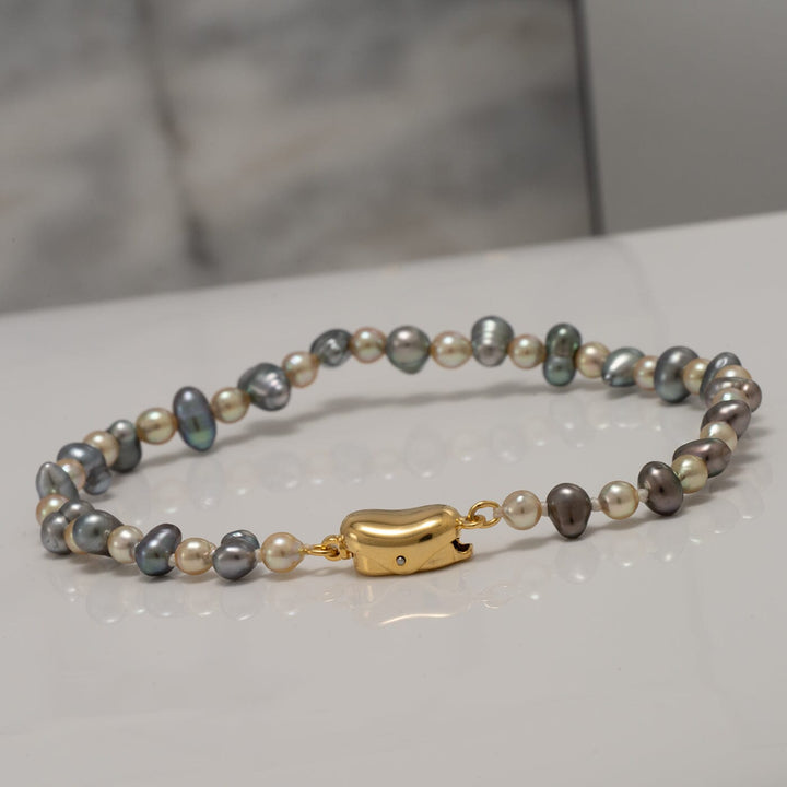JF20-A: 3.5-5.0 mm Tahitian Keshi and Natural Gold Akoya Pearl Bracelet