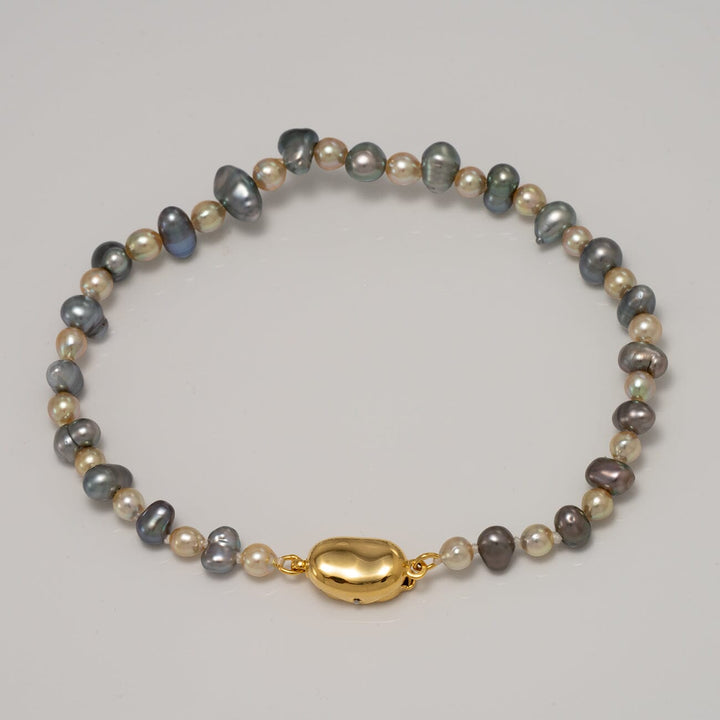 JF20-A: 3.5-5.0 mm Tahitian Keshi and Natural Gold Akoya Pearl Bracelet