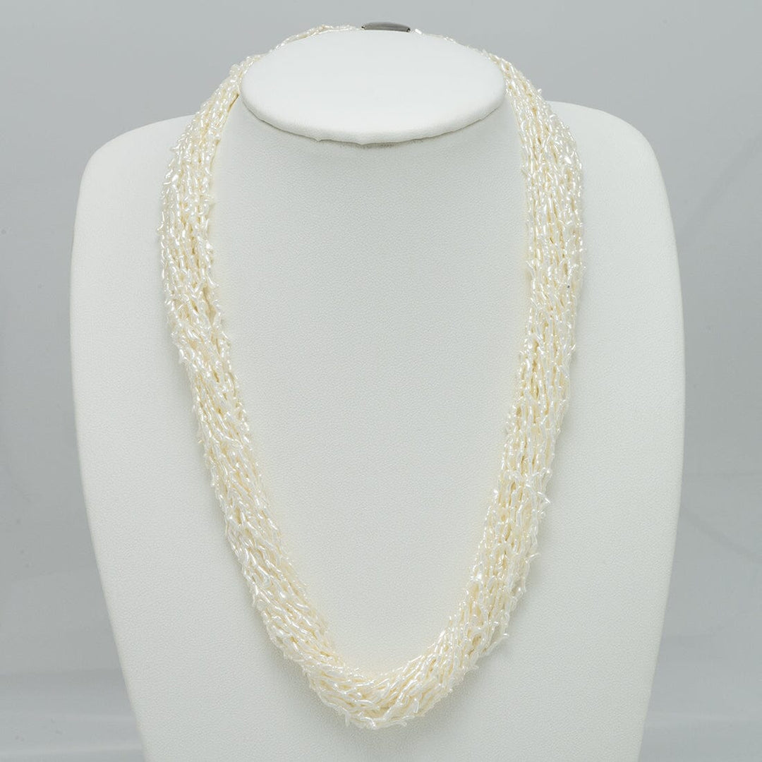 Elegant 1.0-3.0 mm 20 Strand Akoya Keshi Pearl Torsade Diamond Clasp Necklace featuring lustrous white akoya pearls twisted into a sophisticated, multi-strand design.