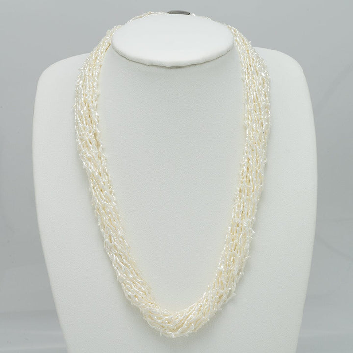 Elegant 1.0-3.0 mm 20 Strand Akoya Keshi Pearl Torsade Diamond Clasp Necklace featuring lustrous white akoya pearls twisted into a sophisticated, multi-strand design.