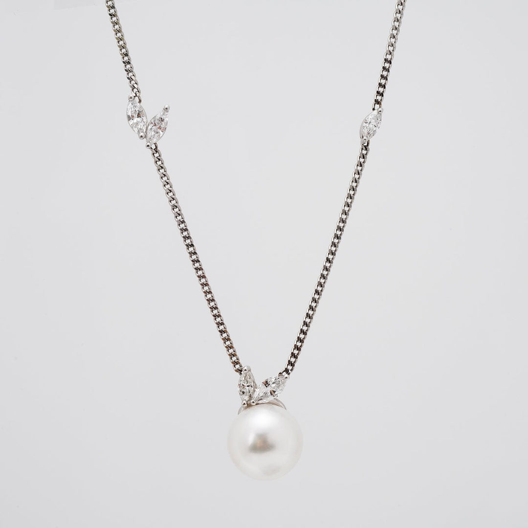 Assael Collection: 10.5-11.0 mm White South Sea Pearl and Diamond Pendant featuring a lustrous white pearl with delicate diamond accents on a fine silver chain.