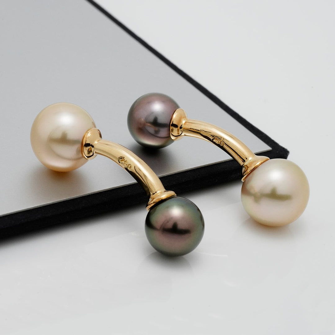 Assael Collection: 9.0–11.4 mm Tahitian and Gold South Sea Cufflinks featuring elegant black and white pearls set on polished gold for a refined, timeless accessory.