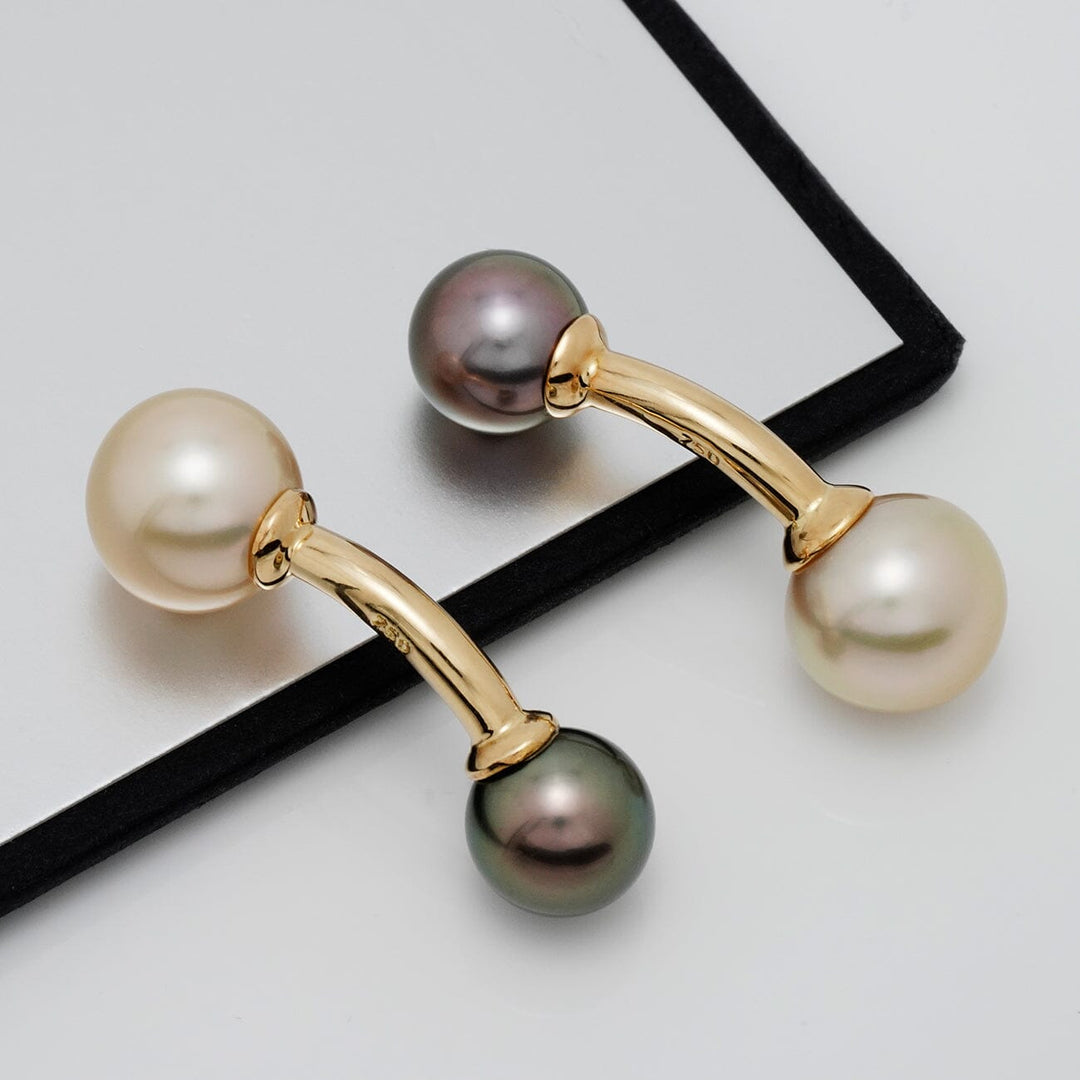 Assael Collection: 9.0–11.4 mm Tahitian and Gold South Sea Cufflinks featuring elegant black and white pearls set on polished gold bars for a sophisticated look.