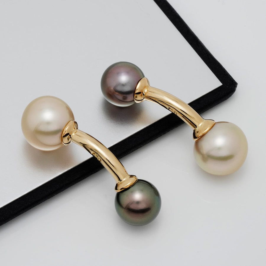 Assael Collection: 9.0–11.4 mm Tahitian and Gold South Sea Cufflinks featuring elegant black and white pearls set on polished gold bars for a sophisticated look.