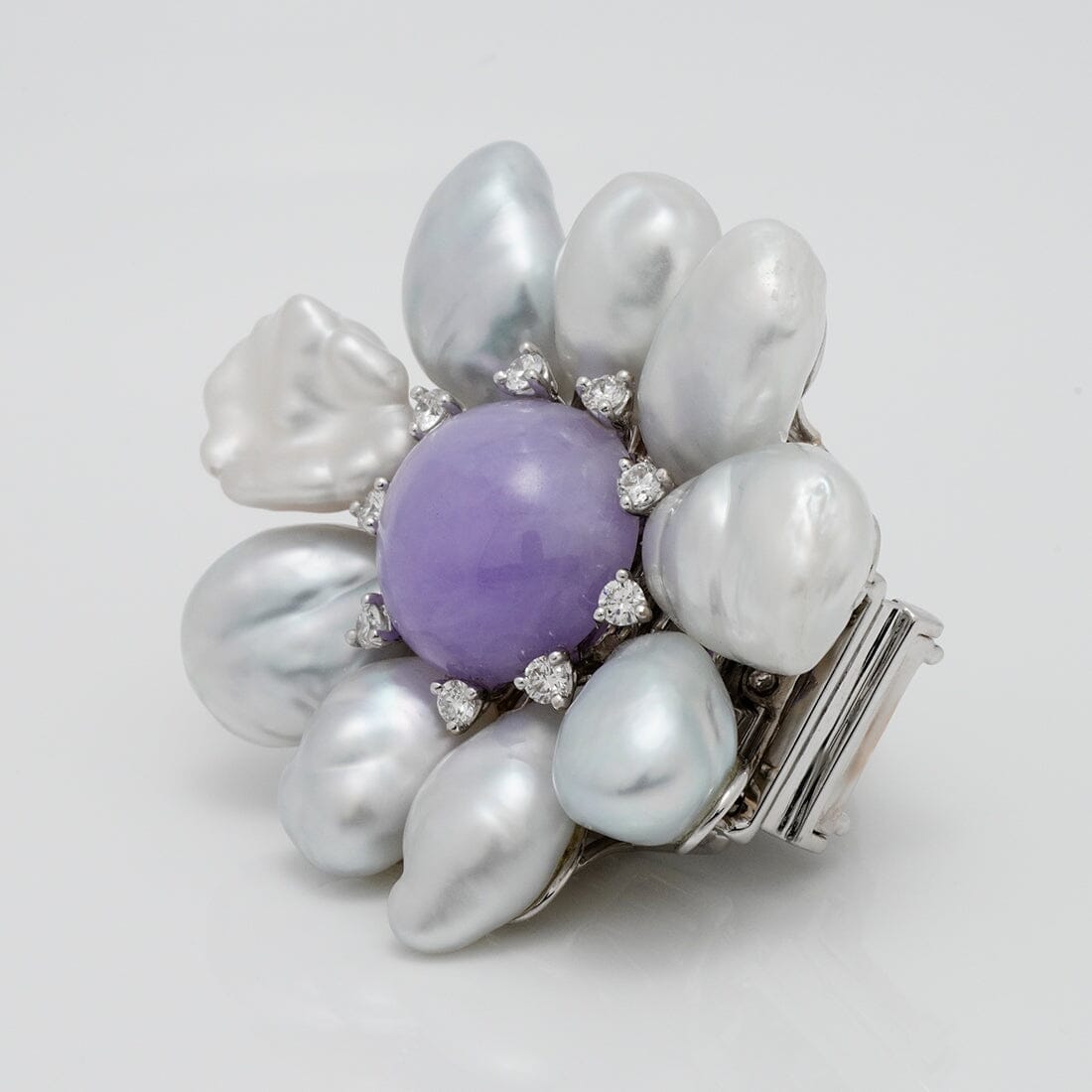 Assael Collection: South Sea Keshi Pearl, Jade & Diamond Brooch featuring irregular South Sea Keshi pearls surrounding a polished lavender jade center with diamond accents in a floral design.