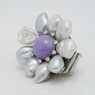 Assael Collection: South Sea Keshi Pearl, Jade & Diamond Brooch featuring irregular South Sea Keshi pearls surrounding a polished lavender jade center with diamond accents in a floral design.