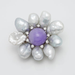 Assael Collection: South Sea Keshi Pearl, Jade & Diamond Brooch featuring lustrous south sea keshi pearls arranged around a central lavender jade stone, accented with sparkling diamonds.