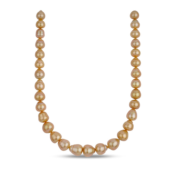 A strand of golden South Sea baroque pearl necklace with a clasp.