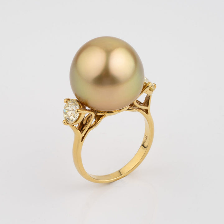 Assael Collection: 15.4 mm Golden South Sea Pearl and Diamond Ring featuring a large lustrous golden pearl set on a delicate yellow gold band accented with sparkling diamonds.