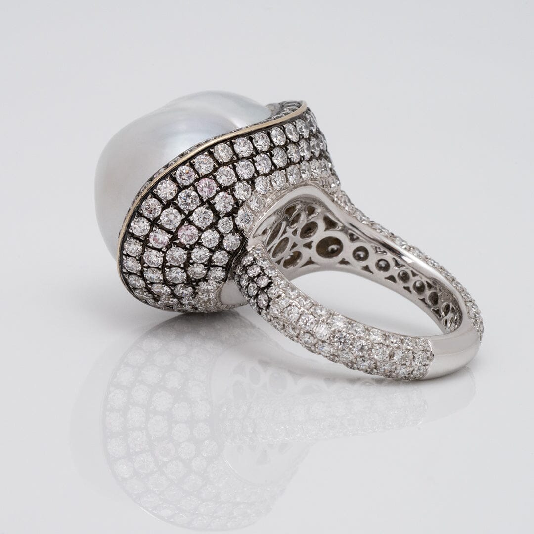 Assael Collection: 22.2 x 18.1 x 17.0 mm Baroque White South Sea Pearl and Diamond Ring featuring a large baroque pearl surrounded by multiple rows of small sparkling diamonds on a 14K white gold band.