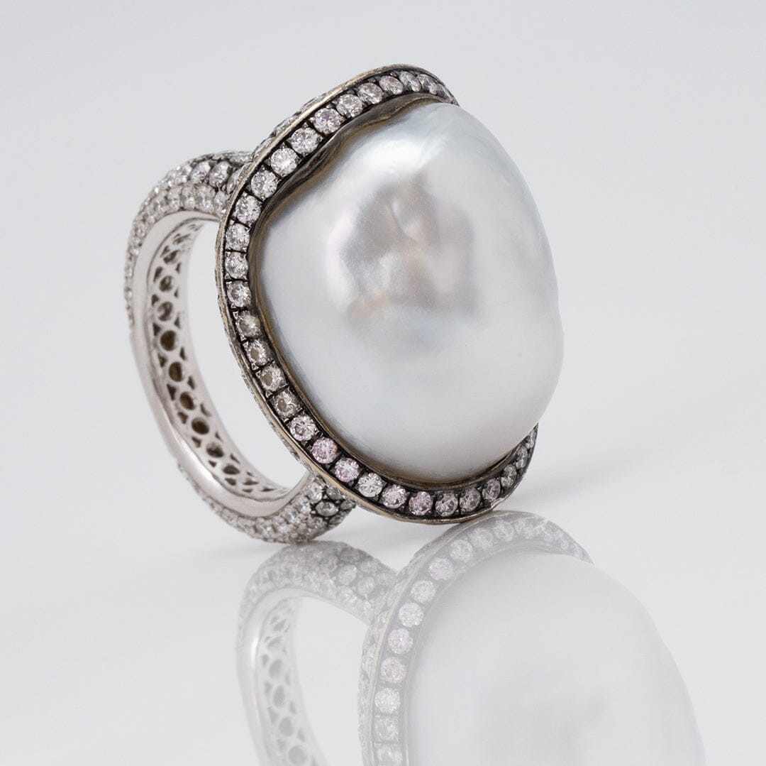 Assael Collection: 22.2 x 18.1 x 17.0 mm Baroque White South Sea Pearl and Diamond Ring featuring a large baroque pearl surrounded by a halo of diamonds on an intricately designed band.
